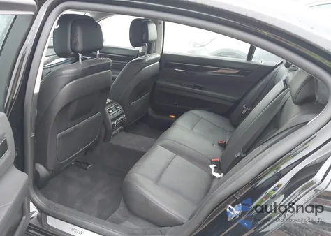 2015 BMW 740Li из США, поврежденный, VIN WBAYE4C51FD946965